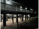 Dark night view of elevated house showing support beams and railings at 1022 Waccamaw Dr., Conway, SC 29526