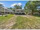 Exterior daytime view of an elevated home with support beams in a spacious yard at 1022 Waccamaw Dr., Conway, SC 29526