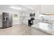 Bright kitchen with stainless steel appliances and marble countertops at 1022 Waccamaw Dr., Conway, SC 29526