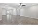Open floor plan featuring gray wood-look floors, and neutral paint at 1022 Waccamaw Dr., Conway, SC 29526