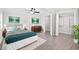 Cozy main bedroom with decor, wood floors, and a spacious closet at 1022 Waccamaw Dr., Conway, SC 29526