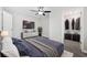 Beautiful main bedroom showcasing an open walk-in closet and a large TV on the wall at 1022 Waccamaw Dr., Conway, SC 29526