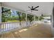 Spacious covered porch with ceiling fans offers stunning views of the river at 1022 Waccamaw Dr., Conway, SC 29526