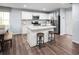 Modern kitchen with stainless steel appliances, granite countertops, and a convenient island with breakfast bar at 1096 Oak Meadow Dr., Conway, SC 29526