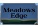 A Meadows Edge community sign with attractive lettering and inviting graphics at 1096 Oak Meadow Dr., Conway, SC 29526