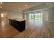 Open-concept kitchen overlooking living area, featuring a large island and sleek cabinetry at 1117 Oxeye St., North Myrtle Beach, SC 29582