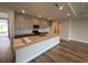 Open-concept kitchen with a large center island, granite countertops, and stainless steel appliances at 1117 Oxeye St., North Myrtle Beach, SC 29582