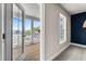 A bedroom balcony offering serene outdoor views and natural light at 135A Sunset Dr., Murrells Inlet, SC 29576
