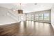 Bright living room featuring hardwood floors, lots of natural light and ceiling fan at 135A Sunset Dr., Murrells Inlet, SC 29576