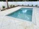 The backyard features a private pool with surrounding white fence, and tile deck at 135A Sunset Dr., Murrells Inlet, SC 29576