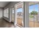 Inviting balcony view through open french doors showcasing outdoor living at 135B Sunset Dr., Murrells Inlet, SC 29576