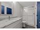 Bathroom featuring a vanity with a single sink, a mirror and tiled shower at 135B Sunset Dr., Murrells Inlet, SC 29576
