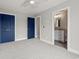 Bedroom with gray carpet, two doorways, and a ceiling fan at 135B Sunset Dr., Murrells Inlet, SC 29576