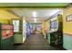Arcade game room with a variety of games and colorful carpeting, perfect for Gathering entertainment at 1501 S Ocean Blvd. # 1422, Myrtle Beach, SC 29577