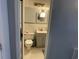 Cozy bathroom with tiled walls and vintage flooring at 1600 Ocean Blvd. S # 204, Myrtle Beach, SC 29577