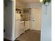 Compact kitchenette featuring essential appliances at 1600 Ocean Blvd. S # 204, Myrtle Beach, SC 29577