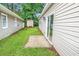View of the backyard, grass, siding and concrete patio at 1636 Stuart Square Circle, Myrtle Beach, SC 29577