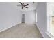 Bedroom features carpet, a ceiling fan, and a walk-in closet at 1636 Stuart Square Circle, Myrtle Beach, SC 29577