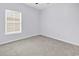 Bedroom with neutral carpet and a window with natural light at 1636 Stuart Square Circle, Myrtle Beach, SC 29577