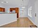 Dining area featuring hardwood floors, natural light, and kitchen access at 1636 Stuart Square Circle, Myrtle Beach, SC 29577