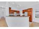 Open kitchen with bar seating, ample counter space, and natural light at 1636 Stuart Square Circle, Myrtle Beach, SC 29577
