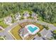 Aerial view of homes in the community showcasing the neighborhood pool at 1662 Westminster Dr., Myrtle Beach, SC 29577