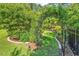 Secluded backyard garden with a charming archway leading to a cozy swing at 1662 Westminster Dr., Myrtle Beach, SC 29577