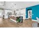 Modern kitchen with white cabinets, large island, stainless steel appliances, and hardwood floors at 1662 Westminster Dr., Myrtle Beach, SC 29577