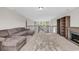 Spacious upstairs loft with a fireplace, a comfy sectional, and abundant natural light at 1662 Westminster Dr., Myrtle Beach, SC 29577