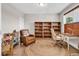 Study with an office desk, a chair, a bookcase, and a leather armchair at 1662 Westminster Dr., Myrtle Beach, SC 29577