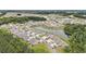 Expansive aerial view of the community with lush greenery, ponds, and well-maintained homes at 1807 Berkley Village Loop, Myrtle Beach, SC 29579
