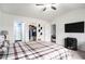 Spacious bedroom with a walk-in closet, television, and en-suite bathroom access at 1807 Berkley Village Loop, Myrtle Beach, SC 29579