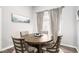 Cozy dining area with a round table, comfortable chairs, and stylish decor for intimate meals at 1807 Berkley Village Loop, Myrtle Beach, SC 29579