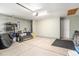 Spacious garage with ample storage, tool racks, and overhead lighting at 1807 Berkley Village Loop, Myrtle Beach, SC 29579