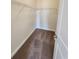 Walk-in closet with neutral carpet, white wire shelving and painted walls at 181 Norris Ln, Loris, SC 29569