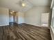 Spacious living room with hardwood flooring, vaulted ceilings, and abundant natural light at 181 Norris Ln, Loris, SC 29569