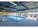 Indoor pool with ocean views and plenty of lounge chairs at 201 74Th Ave. N # 707, Myrtle Beach, SC 29572