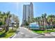 Sand Dunes Resort entrance sign with villas, suites, and condos text at 201 74Th Ave. N # 707, Myrtle Beach, SC 29572