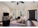 Cozy living room featuring a comfortable sofa, stylish decor, and hardwood floors at 2080 Highway 915, Loris, SC 29569