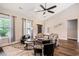Bright living room with high ceilings, comfortable seating, and ample natural light at 2080 Highway 915, Loris, SC 29569