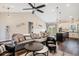 Open-concept living space with a stylish sofa, dining area, and a kitchen island at 2080 Highway 915, Loris, SC 29569
