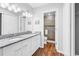Stylish bathroom with granite countertops, dual sinks, and a tiled glass door shower at 213 Westleton Dr. # 16-D, Myrtle Beach, SC 29572