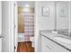 Bathroom with a single sink, and a shower and tub combo with a colorful shower curtain at 213 Westleton Dr. # 16-D, Myrtle Beach, SC 29572