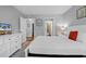 Bedroom featuring white linens and trim, plus access to the kitchen and bath at 213 Westleton Dr. # 16-D, Myrtle Beach, SC 29572