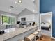 Modern kitchen featuring sleek countertops, stainless steel appliances, and a breakfast bar with seating at 213 Westleton Dr. # 16-D, Myrtle Beach, SC 29572