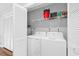 Laundry room featuring a washer and dryer, and shelving at 213 Westleton Dr. # 16-D, Myrtle Beach, SC 29572