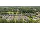 Aerial view of the condo community featuring lush landscaping, parking areas, and a community pool at 2150 Longwood Lakes Dr. # 2150, Myrtle Beach, SC 29579