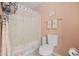 Bathroom with a shower and bathtub combo and peach walls at 2150 Longwood Lakes Dr. # 2150, Myrtle Beach, SC 29579