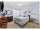 Comfortable bedroom with blue walls, a plush bed, and classic furniture at 2150 Longwood Lakes Dr. # 2150, Myrtle Beach, SC 29579