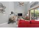 Open living space with vaulted ceilings, ceiling fan, and a view of the backyard at 2150 Longwood Lakes Dr. # 2150, Myrtle Beach, SC 29579